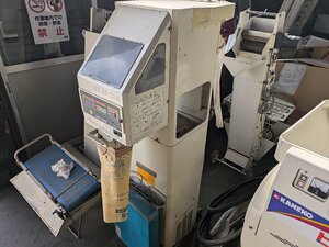 米選別計量器